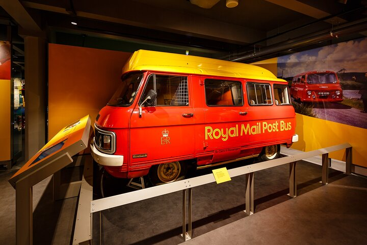 Experience the quirky side of communication history with the Royal Mail Post Bus showcasing the unique journey of postal services in a bold eye-catching setting.